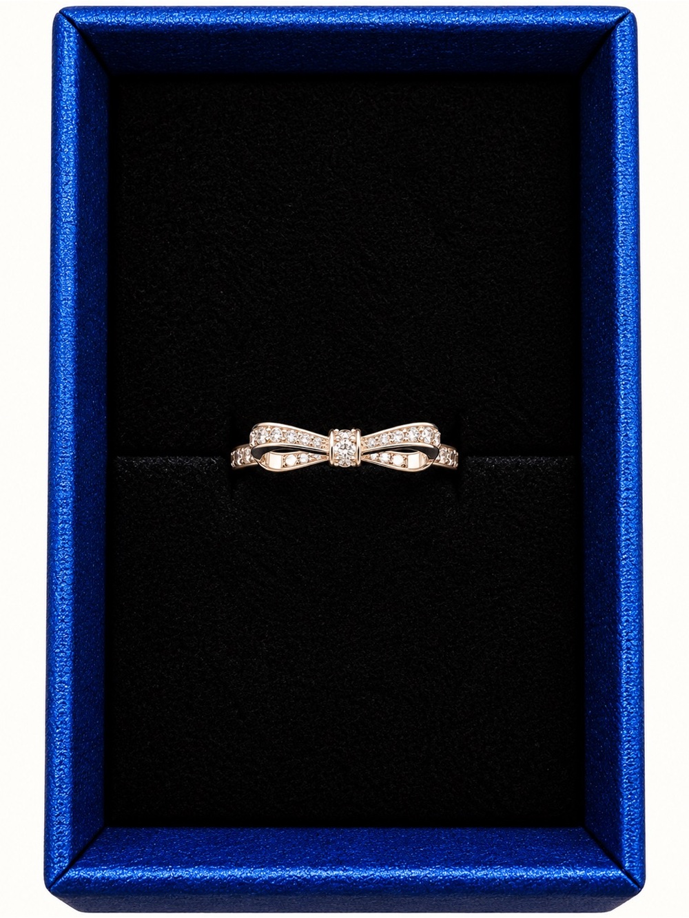 Delicate Bow Ring with Pavé Crystals. Stainless steel and comes with gift box